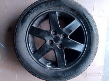 4 gomme  con cerchi in lega nuove