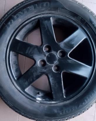 4 gomme  con cerchi in lega nuove