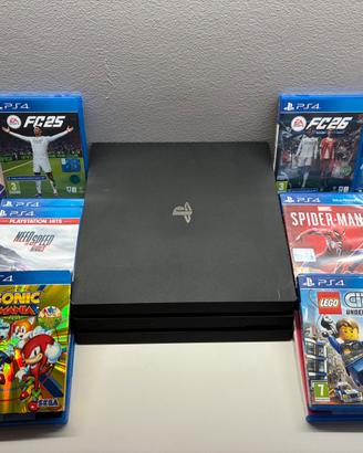 PS4 pro 3 piani + 14 giochi+ 2 joypad
