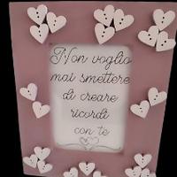 cornice rosa con cuori e dedica