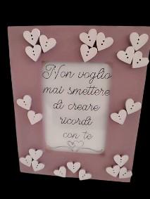 cornice rosa con cuori e dedica