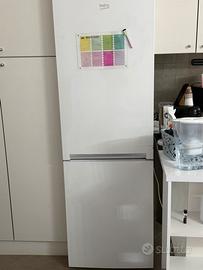 Frigo, lavatrice e cucina