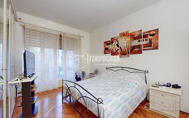 APPARTAMENTO IN BIFAMILIARE CON GIARDINO, CAMBIANO