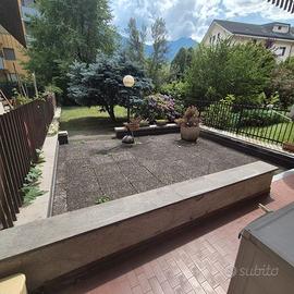 Sondrio quadrilocale con giardino e box