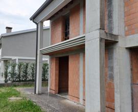 Porzione di Bifamiliare al Grezzo con Giardino