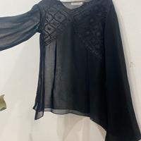 Blusa trasparente nera