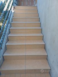 Muratore piastrellista