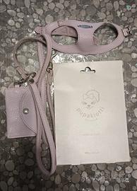 Pettorina e guinzaglio, Pupakiotti