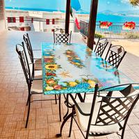 Tavolo Pietra Lavica completo di 6 sedie in ferro