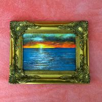 Quadro con cornice dorata in legno 