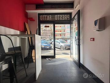 Locale commerciale con canna fumaria