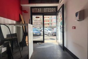 Locale commerciale con canna fumaria