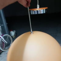 Lampadario in vetro arancione opaco