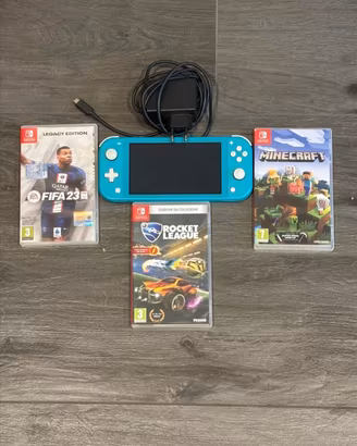 Nintendo Switch Lite + caricatore + 3 giochi