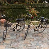 Coppia bici elettriche, uomo e donna