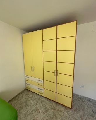 Armadio 4 ante e 4 cassetti