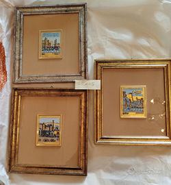 tre serigrafie su foglia d'oro di  Orfeo Tamburi