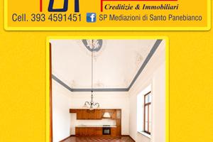 Palazzetto bifamiliare con locale commerciale