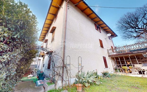 PORZIONE DI CASA CON GIARDINO E TAVERNA A CARPINET