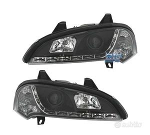 FARI PER OPEL TIGRA 95-03 LUCE DIURNA A LED FONDO 