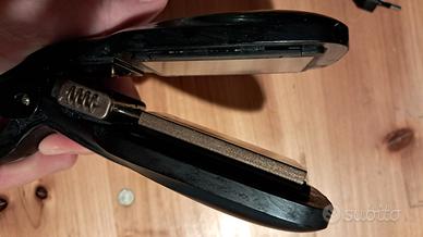 Piastra per capelli con accessori