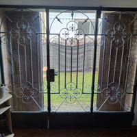 porta a vetro in ferro battuto 