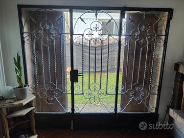 porta a vetro in ferro battuto 