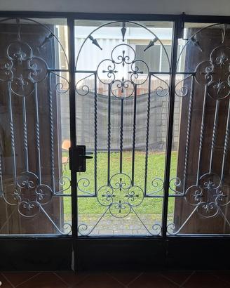 porta a vetro in ferro battuto 