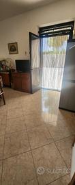 Terreno con casa