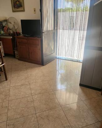 Terreno con casa