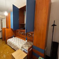 Armadio ponte in legno con ante e cassetti