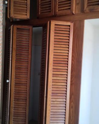 Porte a ventaglio in legno