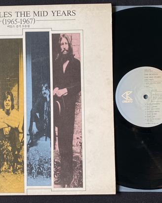 THE BEATLES THE MID YEARS 1965/67” lp “raro vinile
