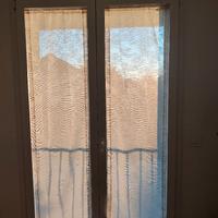 coppia di tende con bastoncini 