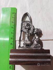 Statuina peltro comunione 