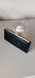 Pochette rigida sera raso nero montatura metallo o