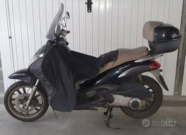 Bauletto originale e coprigambe Piaggio Beverly