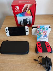 Nintendo Switch OLED con gioco e accessori 
