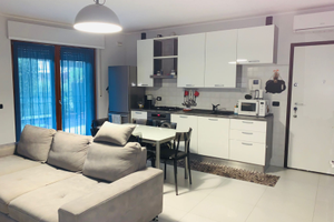 Trilocale piano terra con giardino in Rho centro