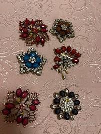 Lotto di spille e collane