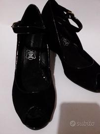 Scarpe nere alte tacco store