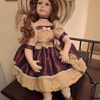 Bambola in porcellana