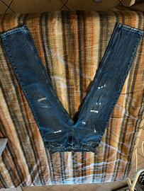 jeans strappati blu icon