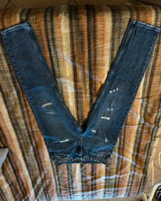 jeans strappati blu icon
