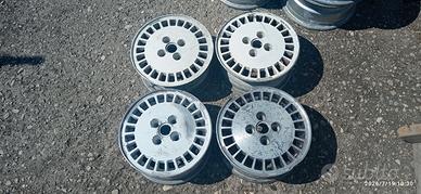 4 cerchi Uno Turbo 13 pollici leggi