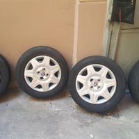 4 cerchi da 14  fiat panda punto copricerchi