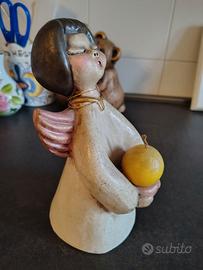 Statuette e orologio Thun