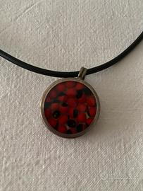 Girocollo con ciondolo in argento e semi huayruro