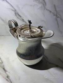 Lattiera vintage ARIR con statuetta
