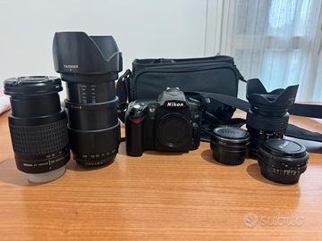 Nikon D90 + 4 obiettivi + accessori — Kit completo